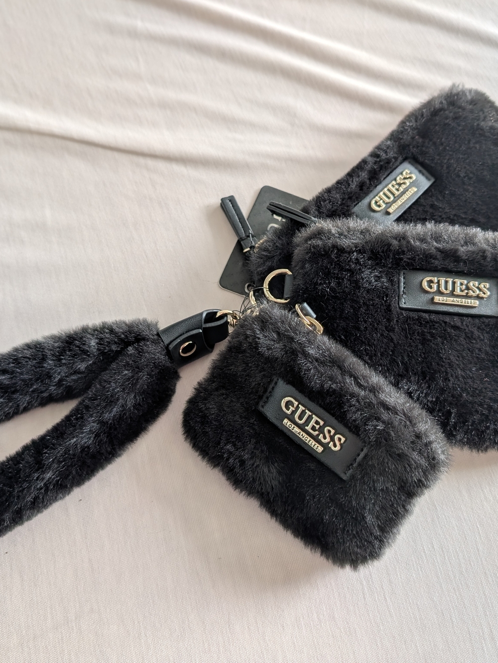 GUESS Black Faux Fur Mini Wristlet Set with Gold Logo